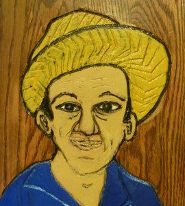 image of a wood carved portrait of Carlos Grasso of Dumfuxx by Charles Gilliam