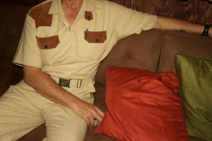 Photo of Carlos Grasso in a jumpsuit.