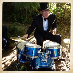 Photo of David Lovering of The Pixies playing drums at a Dumfuxx photo shoot.